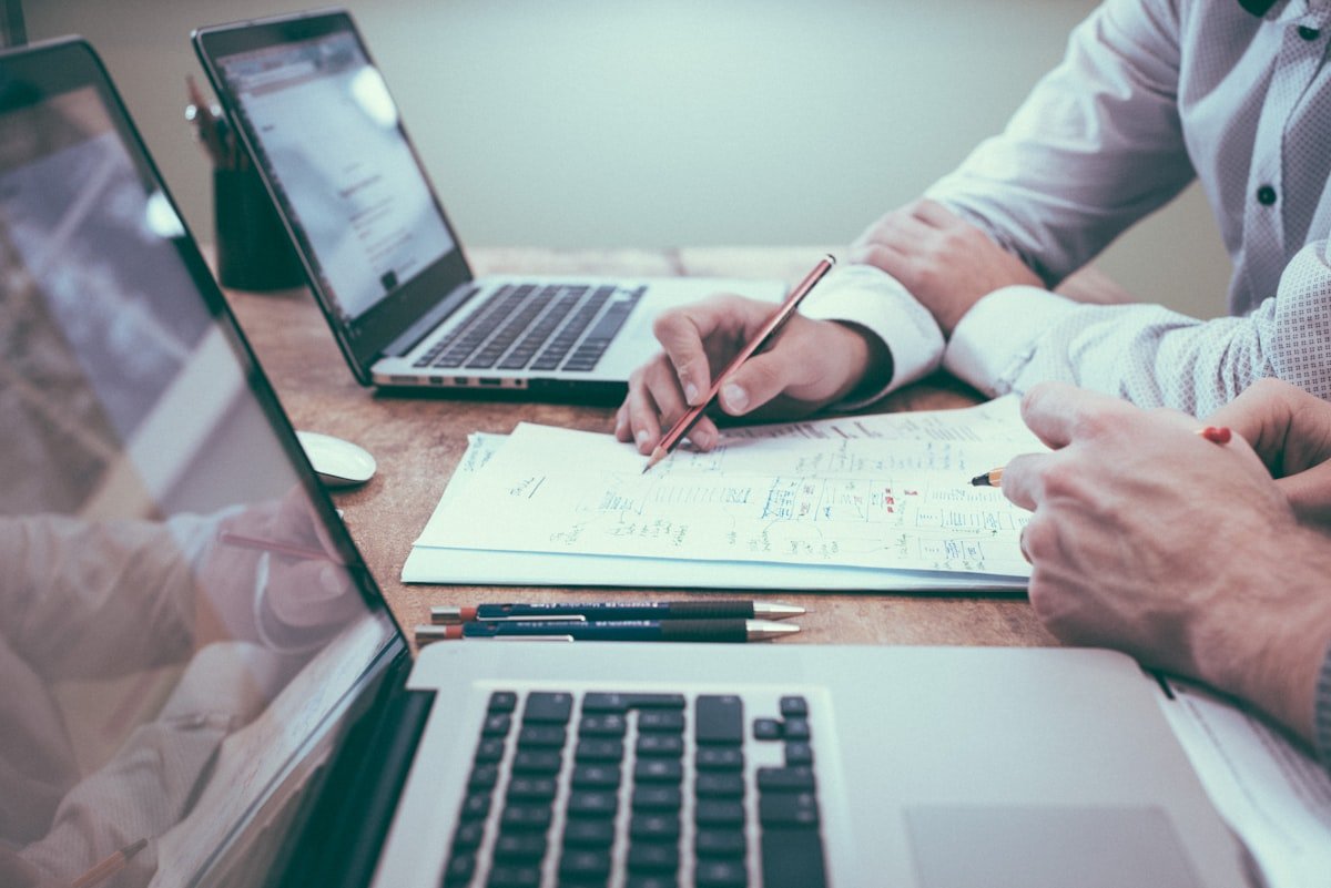 Healthcare administrator optimizing EHR workflow on a computer